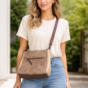 The Sak brown leather crossbody purse handbag travel classic